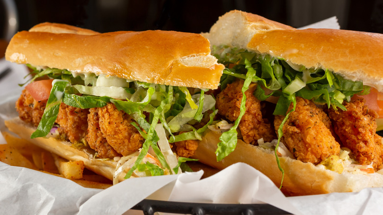 Breaded shrimp on po'boy sandwich with lettuce