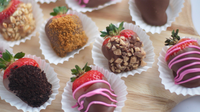 Cutting board with chocolate-covered strawberries