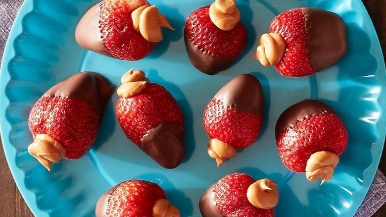 Chocolate-dipped strawberries stuffed with peanut butter