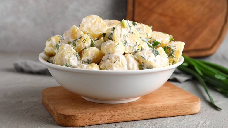 potato salad in white bowl