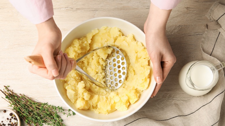 mashing potatoes