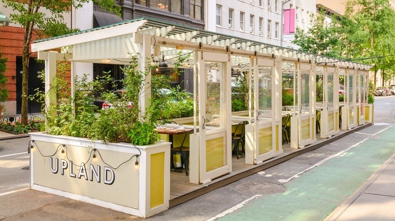 Outside garden-style booths at Upland