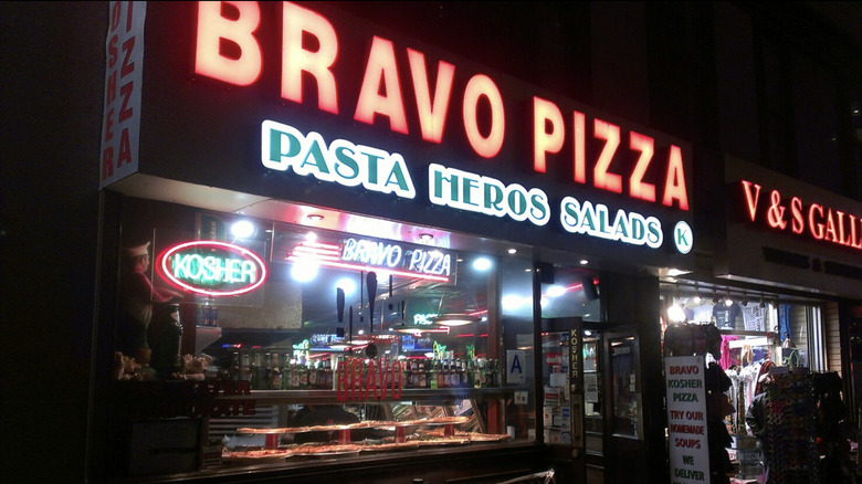 Bravo Pizza lit up sign at night