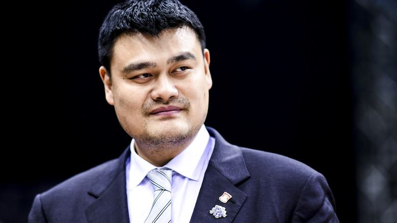 Yao Ming in suit and tie