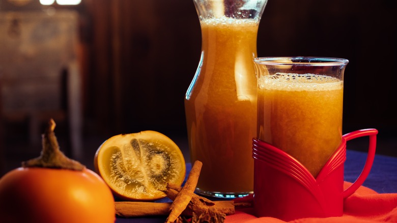 mug and pitcher of canelazo