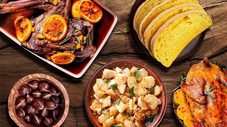 Traditional Thanksgiving foods on wood background