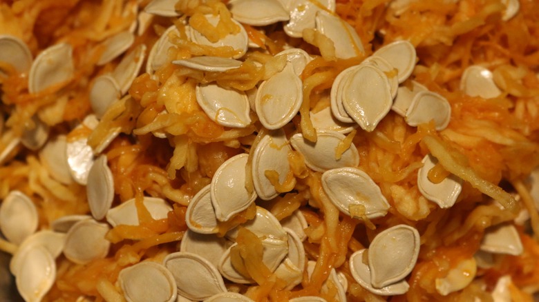 Innards of pumpkin with seeds