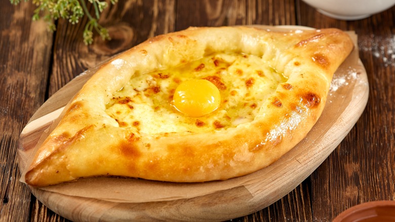 Khachapuri on a wooden board