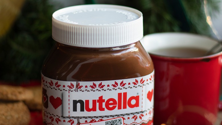 Nutella jar and hot chocolate