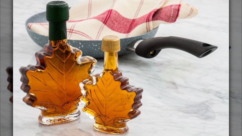 Maple syrup bottles on counter