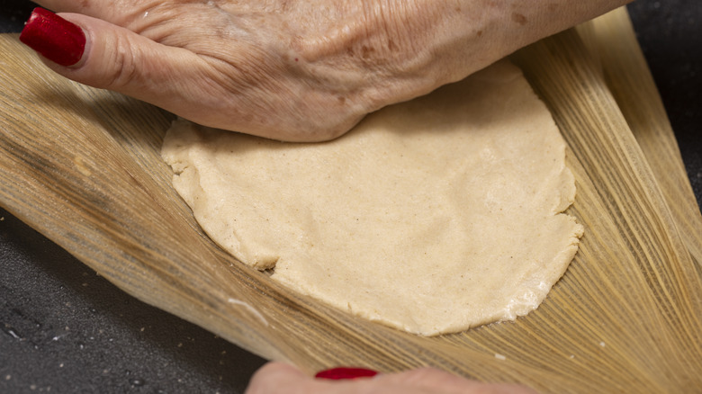 hands shaping masa