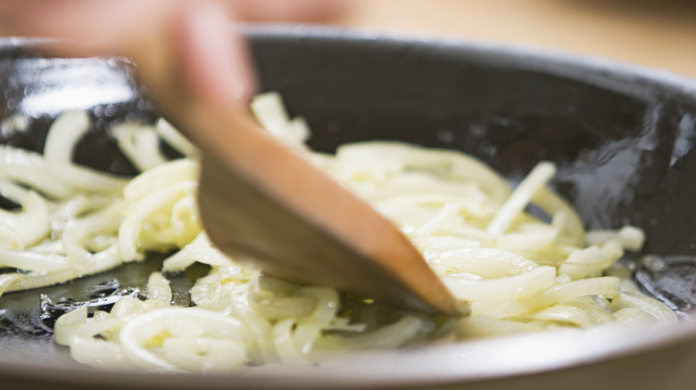 sauteeing onion in  skillet