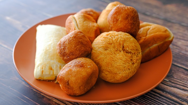 African egg rolls and pie and bread