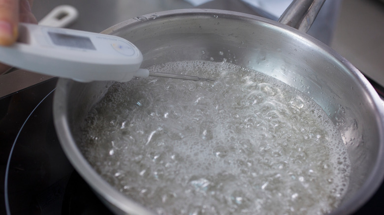 Candy thermometer in pan 