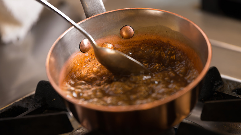Bubbling caramel in a pan 
