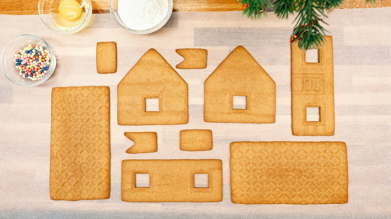 Gingerbread house pieces laid out on counter