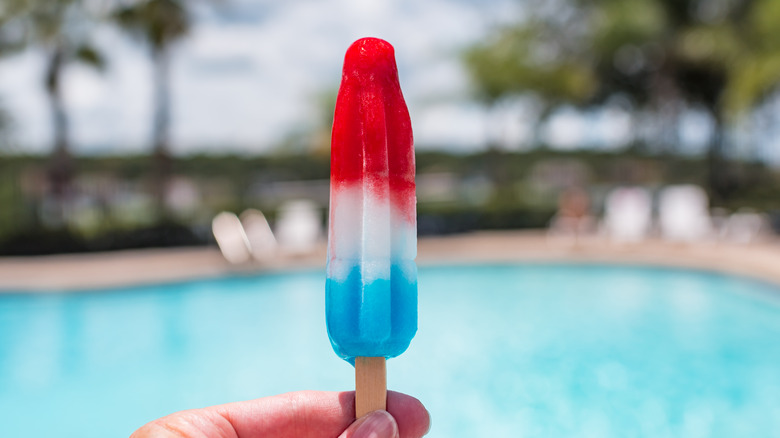 hand holding a Bomb Pop