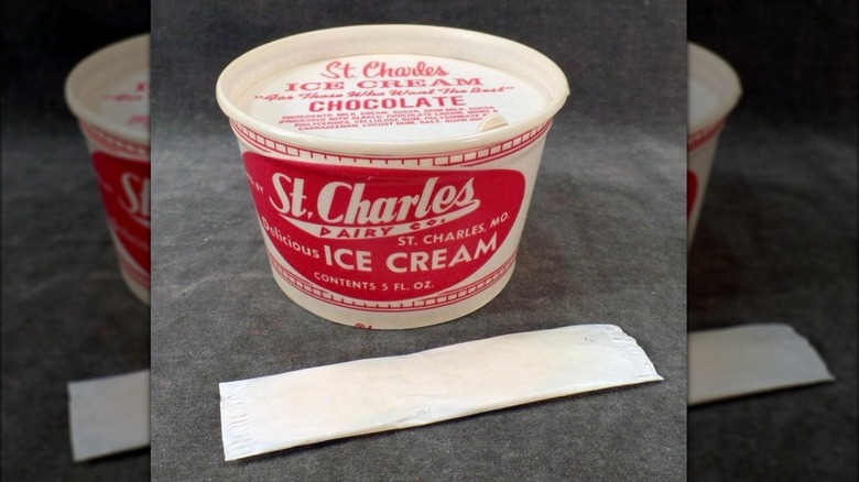 ice cream cup with wooden spoon