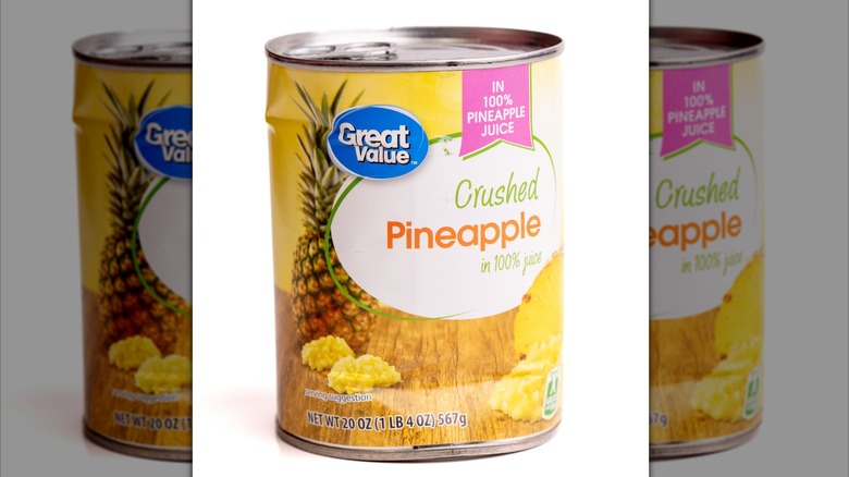 can of pineapple with dents