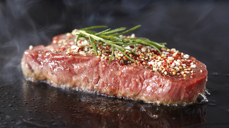 steak being cooked