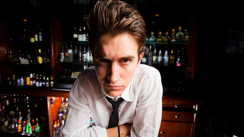 bartender glaring at camera