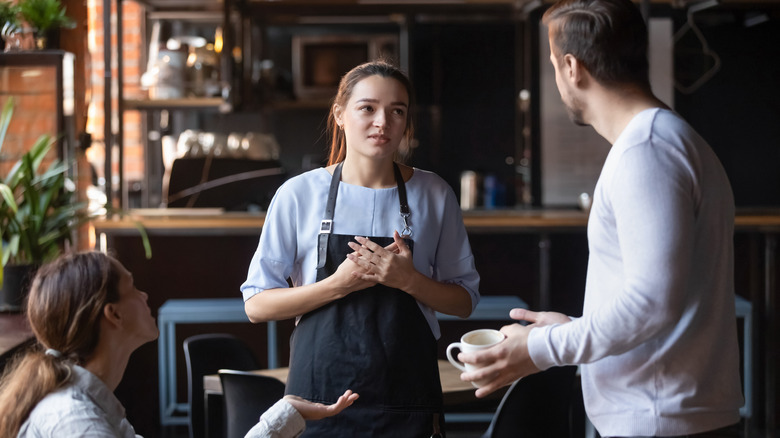 woman being spoken to harshly