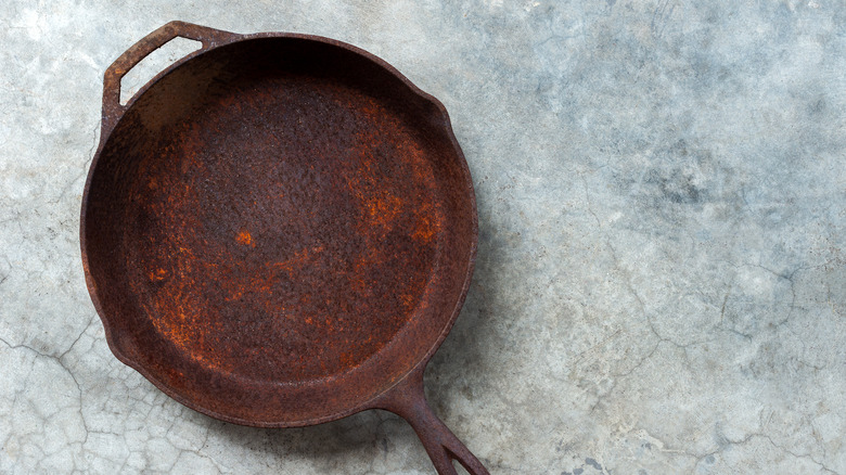 rusty cast iron skillet