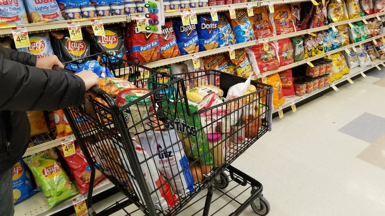 Grocery cart in aisle 
