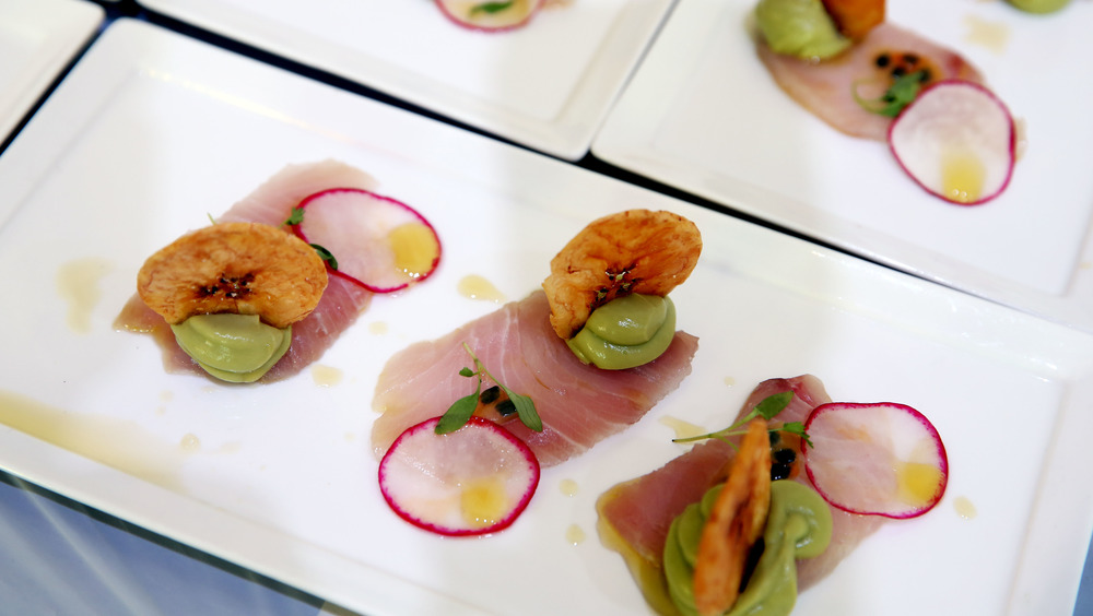 white tuna sashimi on a white plate