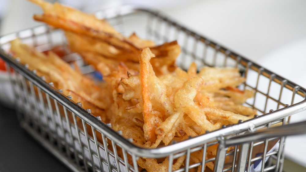 Fried tempura in a fry basket 