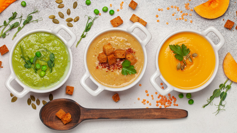 Three soups with different toppings