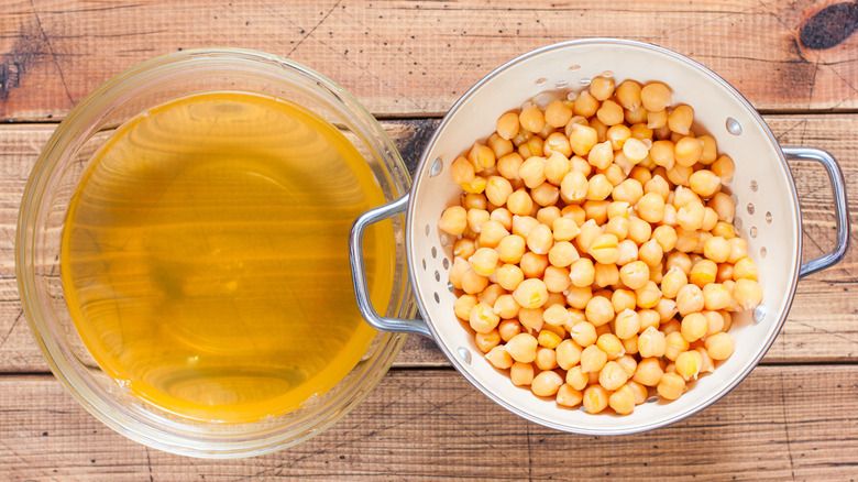 chickpeas next to the chickpea liquid