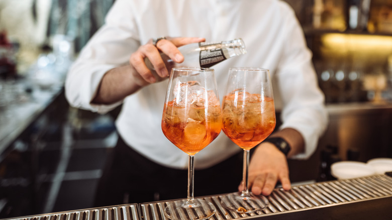 A bartender preparing a cocktail