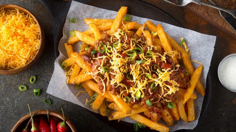 Chili fries on sheet of wax paper