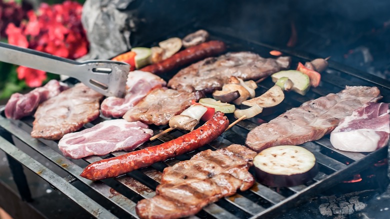 A grill filled with different meats