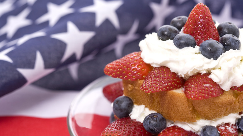 Strawberry and blueberry cake with flag