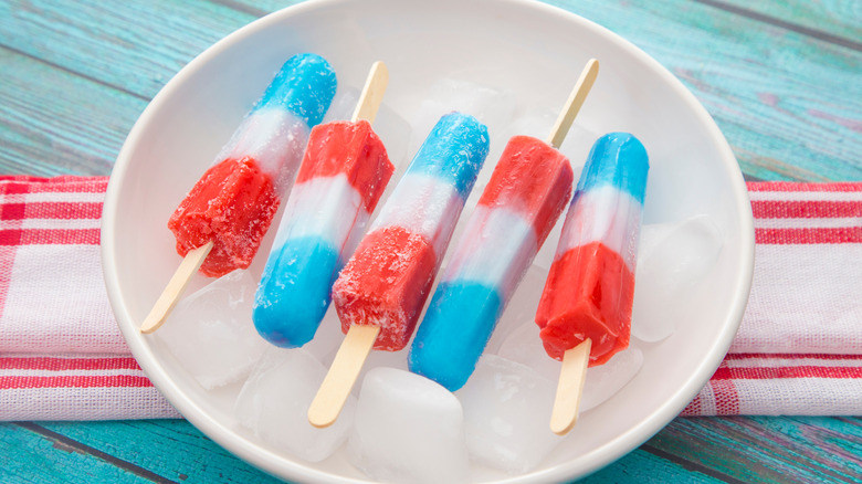 Plate of red, white, and blue popsicles