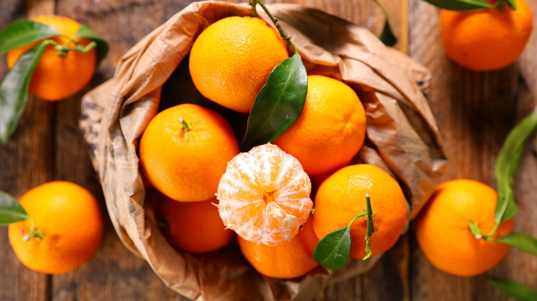 mandarin oranges on a table 