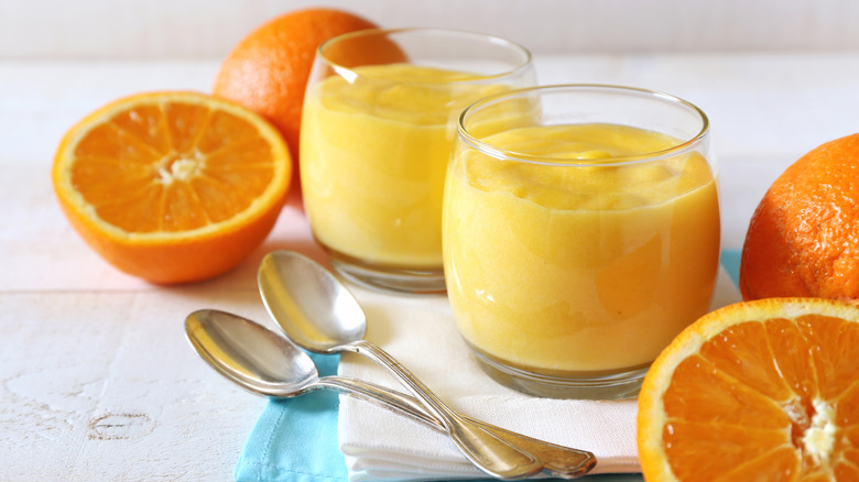 Glasses of orange curd