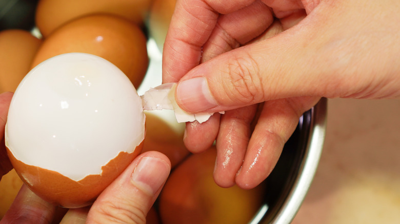 peeled eggs in water