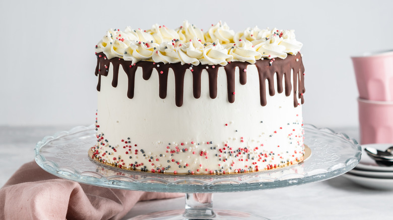 cake with ganache drips and sprinkles