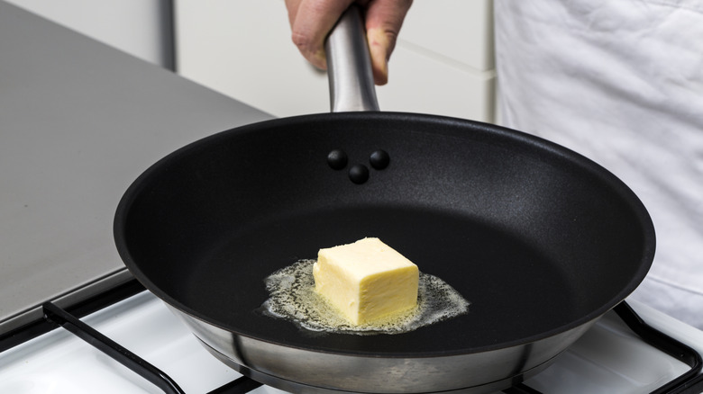 butter melting in pan