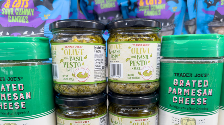 Jars of pesto on a Trader Joe's grocery store shelf