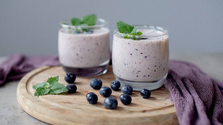 glasses filled with blueberry smoothie