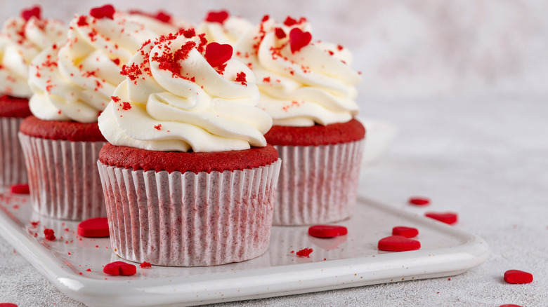 cupcakes topped with whipped frosting