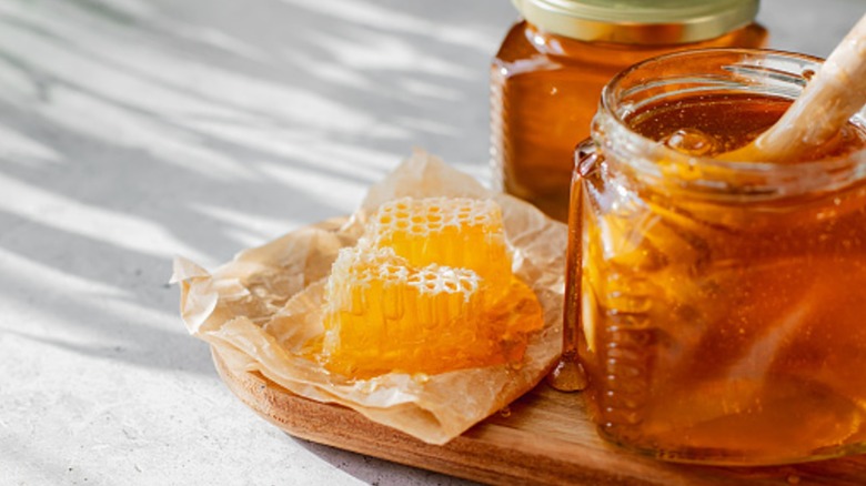 jars of honey and honeycomb