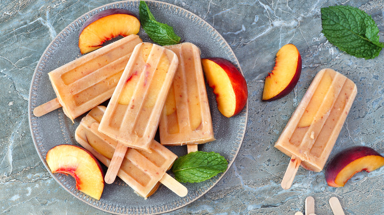 peach yogurt popsicles on plate