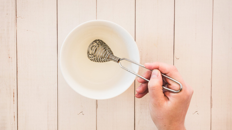 cornstarch and water in bowl with whisk