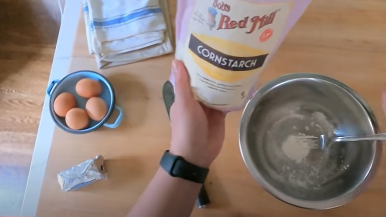 Cornstarch mixed in bowl with eggs