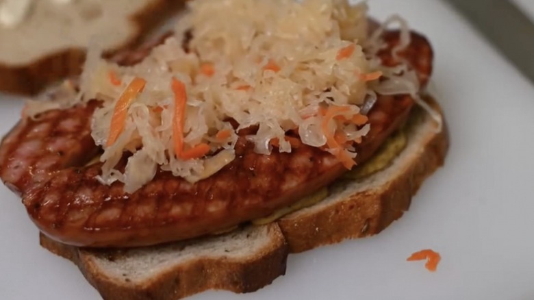 Kielbasa and sauerkraut open faced sandwich